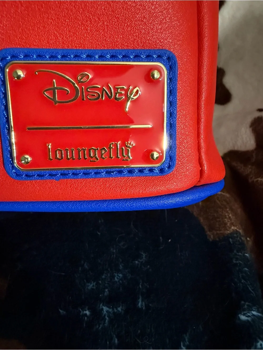 Loungefly Disney Lago Bird Character Backpack in Red, Orange, Blue